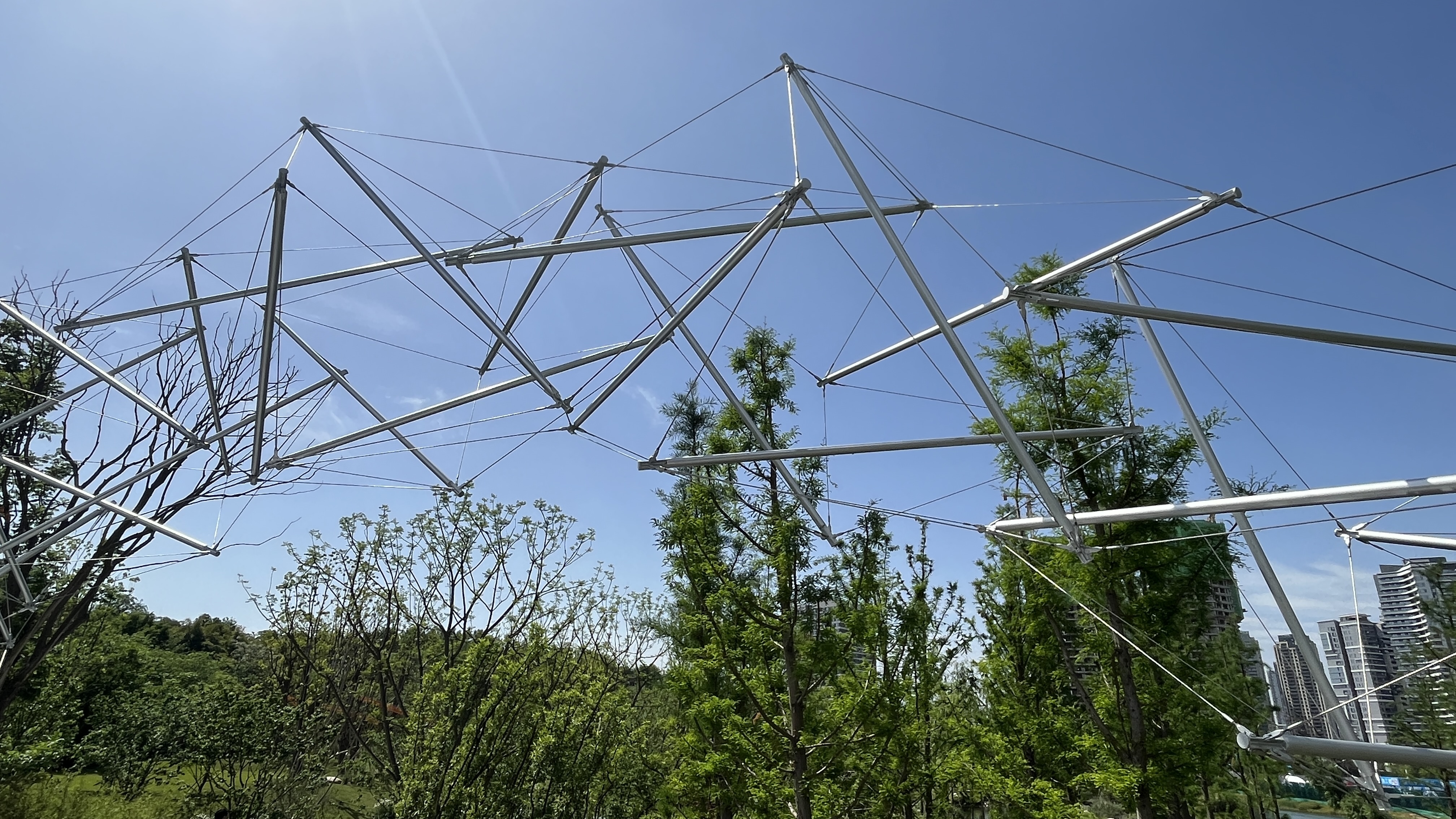 Waves Riding Tensegrity